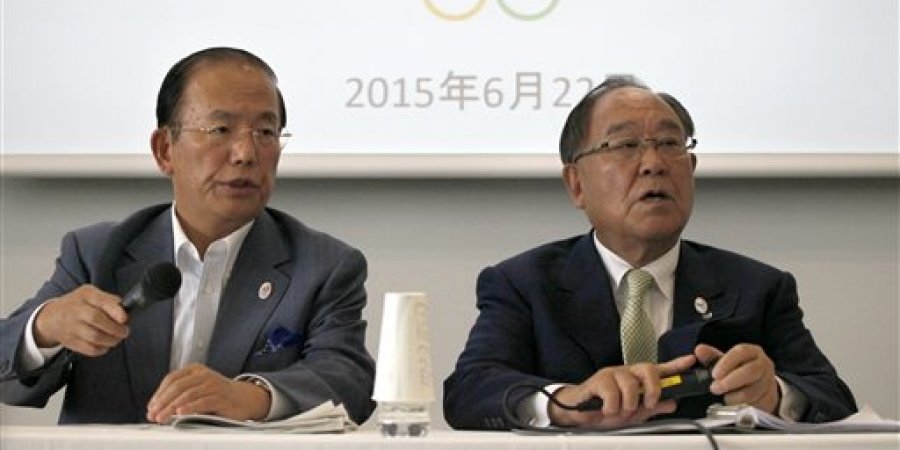Tokyo 2020 Olympics CEO Toshiro Muto, left, and Honorary President Fujio Mitarai speak during a news conference in Tokyo 